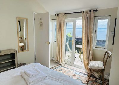 Bedroom 1 french windows to the balcony